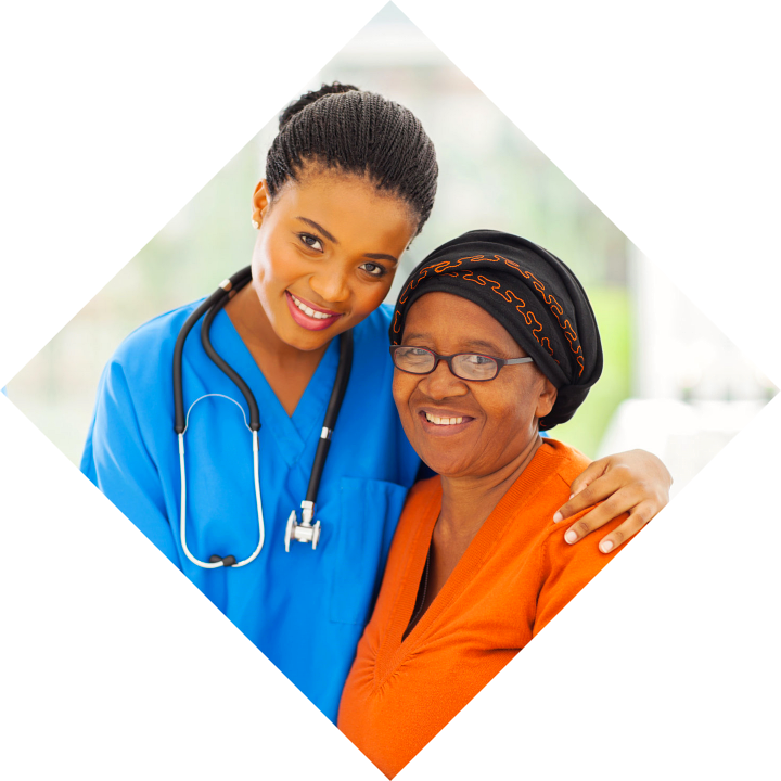 Friendly caring young african nurse and senior patient